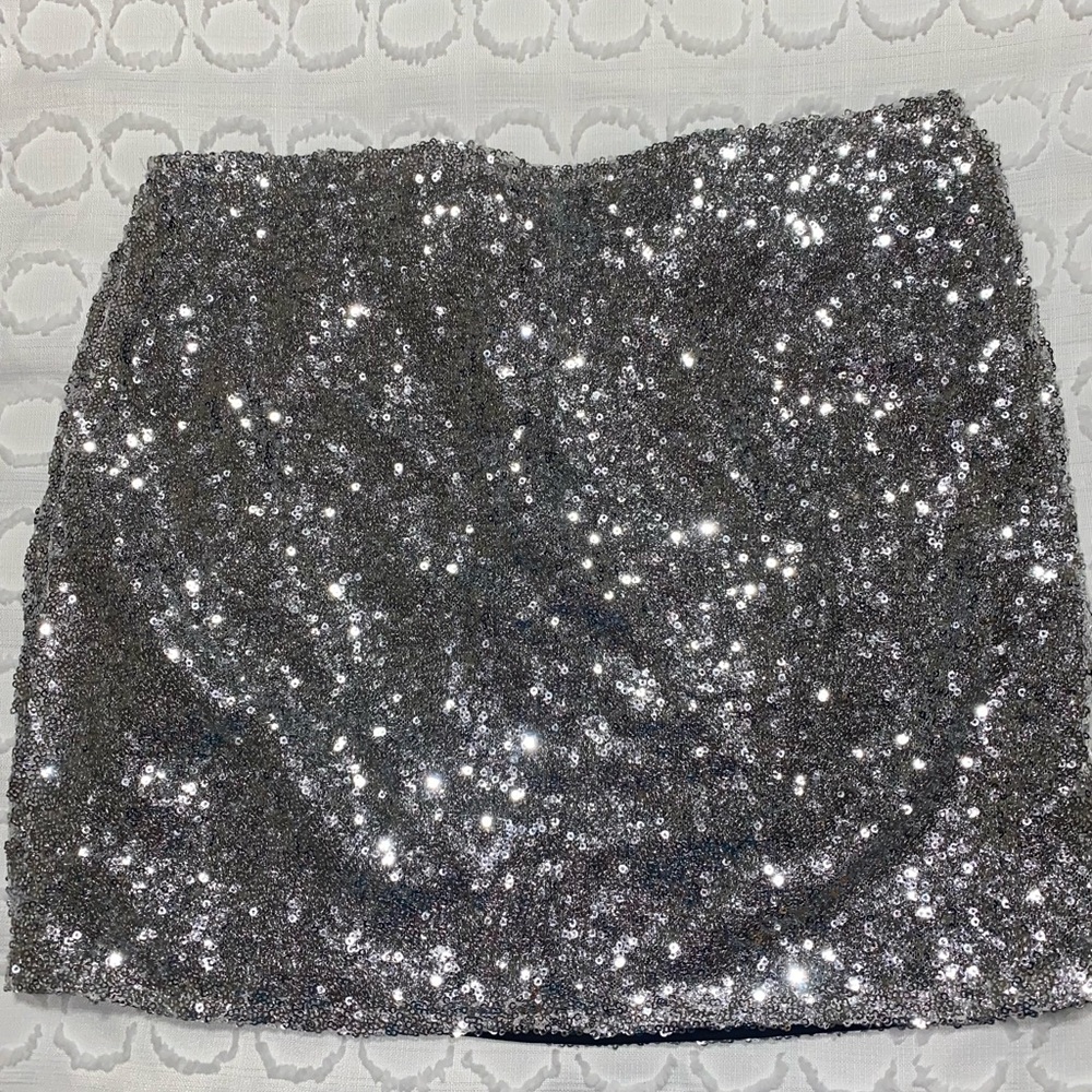 Worn once. Mini sequence skirt.